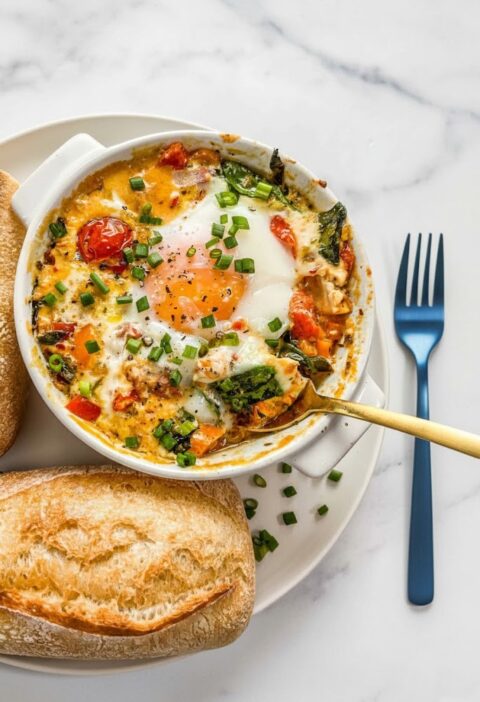 Baked Feta Eggs with Tomatoes and Spinach
