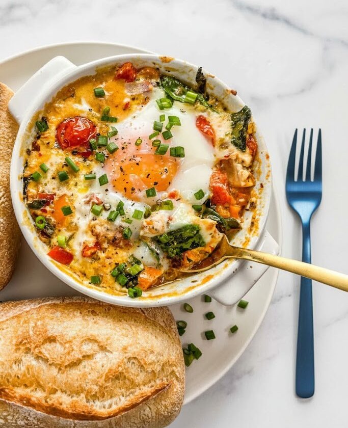 Baked Feta Eggs with Tomatoes and Spinach